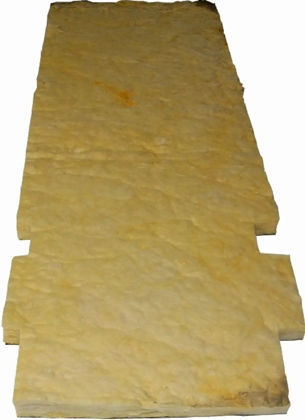 Isoliermaterial in häutiger, gelblicher Ausführung, geeignet zur Wärmedämmung. Produkt von Wolf, unebene Oberfläche, rechteckige Form.
